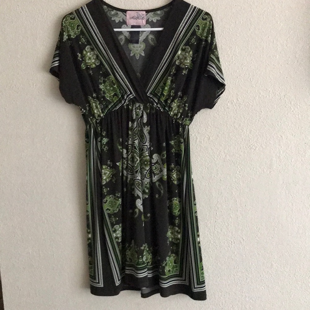 Paisley designed olive colored dress.